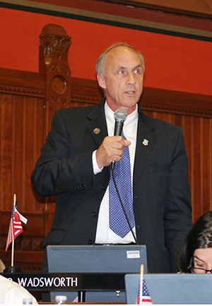 Bill speaks on the House floor.